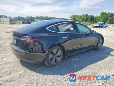 Trzecie zdjęcie samochodu z tyłu: 2019 TESLA MODEL 3 VIN:5YJ3E1EA1KF316677 - miniatura
