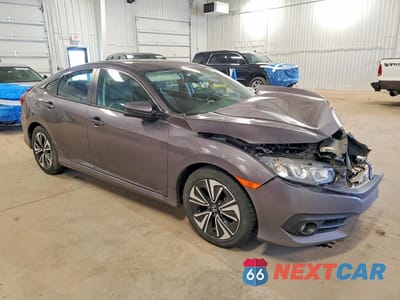 Czwarte zdjęcie samochodu z boku: 2017 HONDA CIVIC EXL VIN:19XFC1F70HE026130 - miniatura