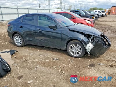 Czwarte zdjęcie samochodu z boku: 2016 SCION IA BASE VIN:3MYDLBZV4GY112059 - miniatura