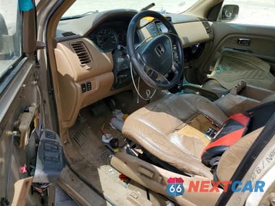 Zdjęcie 8 z 12 samochodu: 2003 HONDA PILOT EXL VIN:2HKYF18563H553069 - miniatura