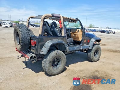 Trzecie zdjęcie samochodu z tyłu: 1997 JEEP WRANGLER / TJ SAHARA VIN:1J4FY49S4VP520144 - miniatura