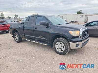 Czwarte zdjęcie samochodu z boku: 2009 TOYOTA TUNDRA SR5 VIN:5TFRU54119X020340 - miniatura