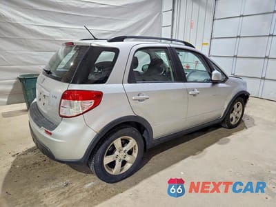 Trzecie zdjęcie samochodu z tyłu: 2012 SUZUKI SX4 VIN:JS2YB5A35C6304208 - miniatura