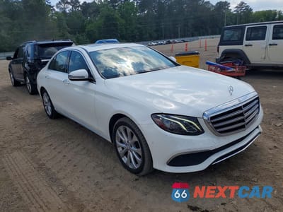 Czwarte zdjęcie samochodu z boku: 2017 MERCEDES-BENZ E 300 VIN:WDDZF4JB0HA084877 - miniatura