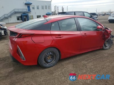 Trzecie zdjęcie samochodu z tyłu: 2022 TOYOTA PRIUS PRIME LE VIN:JTDKAMFP5N3218488 - miniatura