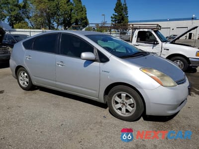 Czwarte zdjęcie samochodu z boku: 2006 TOYOTA PRIUS BASE VIN:JTDKB20U867541170 - miniatura