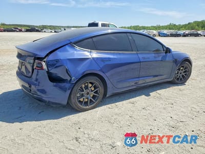 Trzecie zdjęcie samochodu z tyłu: 2022 TESLA MODEL 3 VIN:5YJ3E1EA5NF188738 - miniatura
