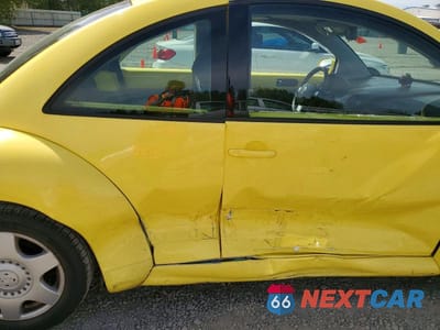 Zdjęcie 11 z 13 samochodu: 2001 VOLKSWAGEN NEW BEETLE GLS TDI VIN:3VWCP21C41M475479 - miniatura