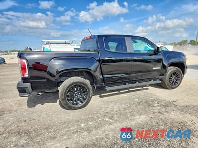 Trzecie zdjęcie samochodu z tyłu: 2021 GMC CANYON ELEVATION VIN:1GTG5BEN1M1179259 - miniatura