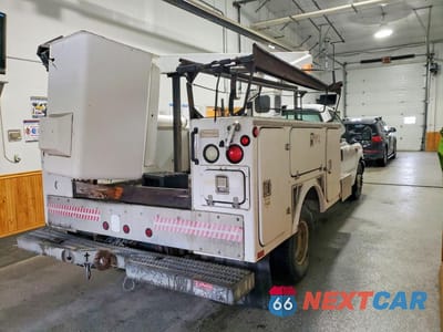 Trzecie zdjęcie samochodu z tyłu: 1999 FORD F350 SUPER DUTY VIN:1FDWF36S6XED12559 - miniatura