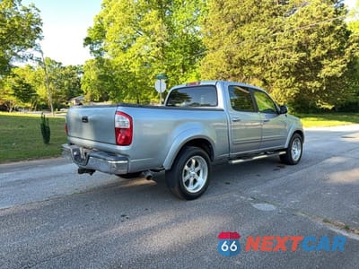 Czwarte zdjęcie samochodu z boku: 2006 TOYOTA TUNDRA DOUBLE CAB SR5 VIN:5TBET34176S540235 - miniatura