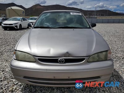 Piąte zdjęcie samochodu w środku: 1999 TOYOTA COROLLA VE VIN:1NXBR12E2XZ231168 - miniatura