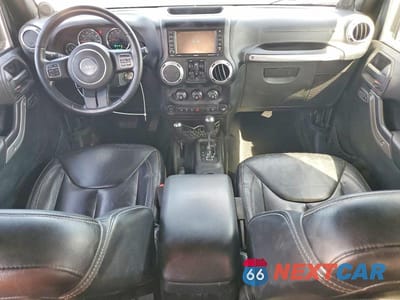Zdjęcie 8 z 13 samochodu: 2014 JEEP WRANGLER UNLIMITED SAHARA VIN:1C4HJWEG0EL271977 - miniatura
