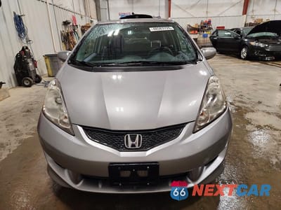 Piąte zdjęcie samochodu w środku: 2009 HONDA FIT SPORT VIN:JHMGE88489C003812 - miniatura