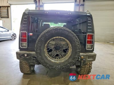 Zdjęcie 6 z 12 samochodu: 2004 HUMMER H2 VIN:5GRGN23U54H121073 - miniatura