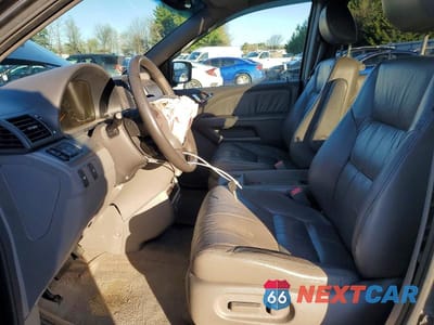 Zdjęcie 7 z 13 samochodu: 2010 HONDA ODYSSEY EXL VIN:5FNRL3H73AB100629 - miniatura