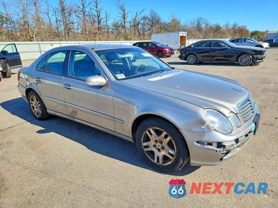 Czwarte zdjęcie samochodu z boku: 2005 MERCEDES-BENZ E 320 4MATIC VIN:WDBUF82J15X169378 - miniatura