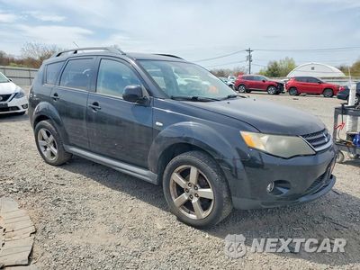 Czwarte zdjęcie samochodu z boku: 2009 MITSUBISHI OUTLANDER ES VIN:JA4LT21W79Z007405 - miniatura