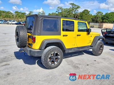 Trzecie zdjęcie samochodu z tyłu: 2009 JEEP WRANGLER UNLIMITED X VIN:1J4GA39169L700197 - miniatura
