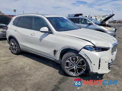 Czwarte zdjęcie samochodu z boku: 2026 BMW X5 XDRIVE40I VIN:5UX23EU08T9254819 - miniatura