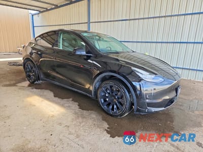 Czwarte zdjęcie samochodu z boku: 2022 TESLA MODEL Y VIN:7SAYGDEE9NF480769 - miniatura