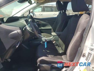 Zdjęcie 7 z 12 samochodu: 2021 TOYOTA PRIUS L ECO VIN:JTDKAMFU7M3139747 - miniatura