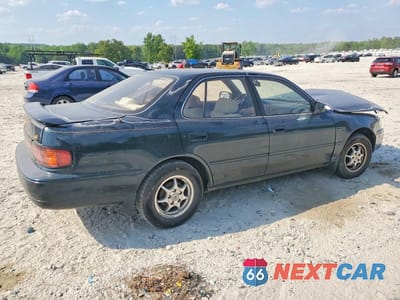 Trzecie zdjęcie samochodu z tyłu: 1994 TOYOTA CAMRY LE VIN:JT2SK12E9R0250330 - miniatura