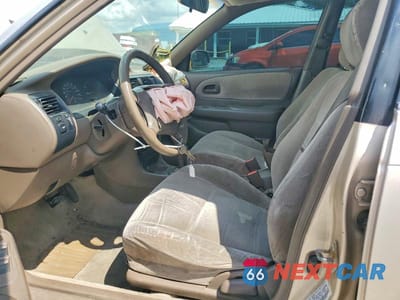 Zdjęcie 7 z 12 samochodu: 1997 TOYOTA COROLLA DX VIN:1NXBB02E6VZ514202 - miniatura