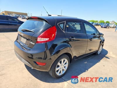 Trzecie zdjęcie samochodu z tyłu: 2011 FORD FIESTA SE VIN:3FADP4EJ9BM172300 - miniatura