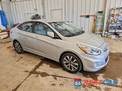 Czwarte zdjęcie samochodu z boku: 2016 HYUNDAI ACCENT SE VIN:KMHCU4AE8GU045267 - miniatura