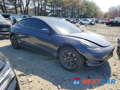 Czwarte zdjęcie samochodu z boku: 2023 TESLA MODEL 3 VIN:5YJ3E1EA4PF690949 - miniatura