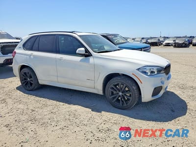 Czwarte zdjęcie samochodu z boku: 2018 BMW X5 XDR40E VIN:5UXKT0C56J0V99493 - miniatura