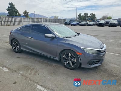 Czwarte zdjęcie samochodu z boku: 2016 HONDA CIVIC TOURING VIN:2HGFC3B99GH357280 - miniatura