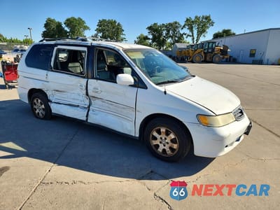 Czwarte zdjęcie samochodu z boku: 2003 HONDA ODYSSEY EXL VIN:5FNRL18043B094348 - miniatura