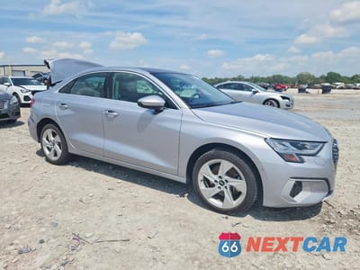 Czwarte zdjęcie samochodu z boku: 2022 AUDI A3 PREMIUM VIN:WAUAUDGYXNA105462 - miniatura