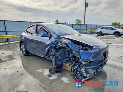 Czwarte zdjęcie samochodu z boku: 2023 TESLA MODEL Y VIN:7SAYGDEE6PF615967 - miniatura