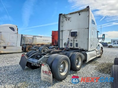 Czwarte zdjęcie samochodu z boku: 2020 KENWORTH T680 SEMI TRUCK VIN:1XKYDP9X0LJ311141 - miniatura