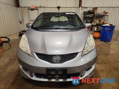 Piąte zdjęcie samochodu w środku: 2009 HONDA FIT SPORT VIN:JHMGE88489S054975 - miniatura