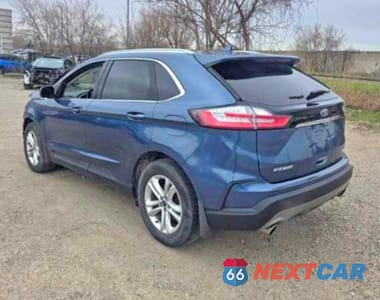 Trzecie zdjęcie samochodu z tyłu: 2019 FORD EDGE SEL VIN:2FMPK3J95KBC07908 - miniatura