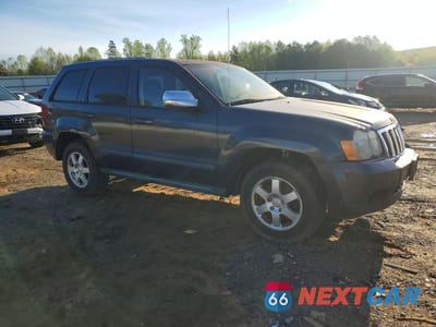 Czwarte zdjęcie samochodu z boku: 2008 JEEP GRAND CHEROKEE LAREDO VIN:1J8GR48K98C119427 - miniatura