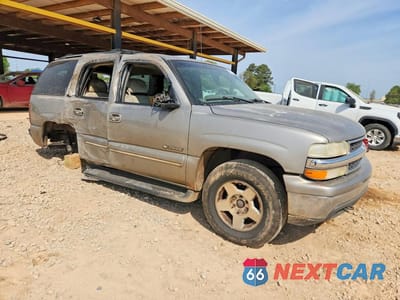 Czwarte zdjęcie samochodu z boku: 2000 CHEVROLET TAHOE K1500 VIN:1GNEK13T1YJ173079 - miniatura