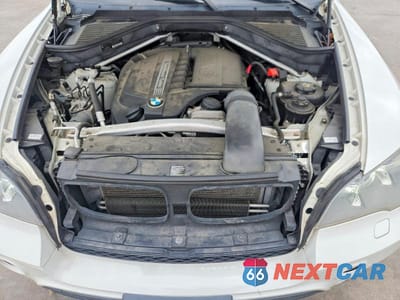 Zdjęcie 12 z 13 samochodu: 2013 BMW X5 XDRIVE35I VIN:5UXZV4C56D0B17645 - miniatura