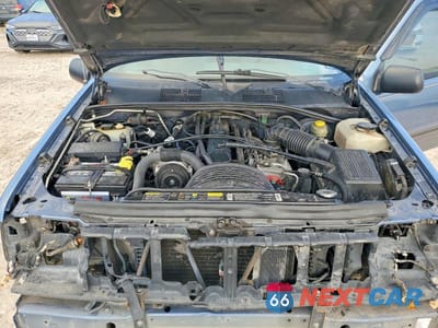 Zdjęcie 12 z 14 samochodu: 1995 JEEP GRAND CHEROKEE LAREDO VIN:1J4GZ58S3SC581352 - miniatura