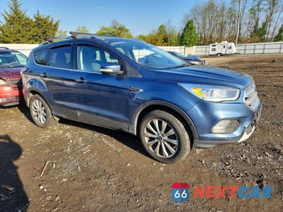 Czwarte zdjęcie samochodu z boku: 2018 FORD ESCAPE TITANIUM VIN:1FMCU9J92JUA66963 - miniatura