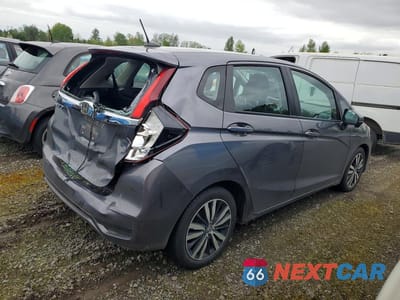 Trzecie zdjęcie samochodu z tyłu: 2020 HONDA FIT EX VIN:3HGGK5H81LM725061 - miniatura