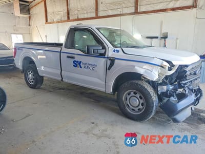 Czwarte zdjęcie samochodu z boku: 2022 FORD F150 VIN:1FTMF1E57NKE03477 - miniatura