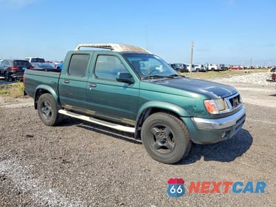 Czwarte zdjęcie samochodu z boku: 2000 NISSAN FRONTIER XE VIN:1N6ED27Y4YC369601 - miniatura