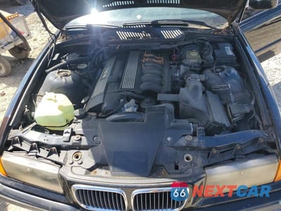 Zdjęcie 11 z 12 samochodu: 1998 BMW 323 IS VIN:WBABF7326WEH40760 - miniatura