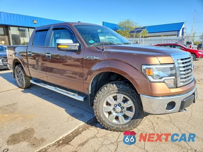 Czwarte zdjęcie samochodu z boku: 2011 FORD F150 SUPERCREW VIN:1FTFW1EF7BFC75862 - miniatura