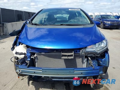 Piąte zdjęcie samochodu w środku: 2015 HONDA FIT LX VIN:3HGGK5H59FM722404 - miniatura